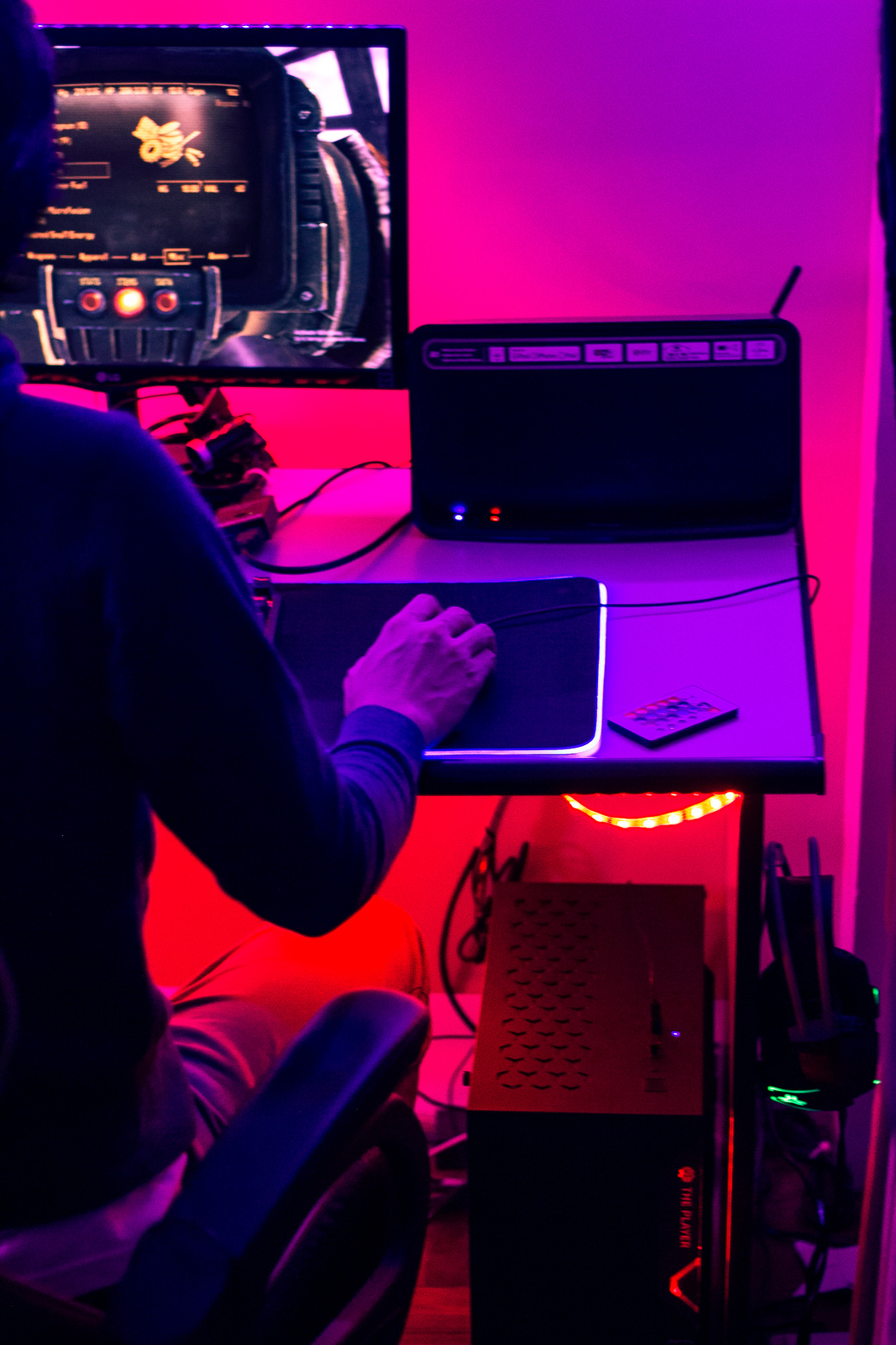 Man Playing Video Game on Computer